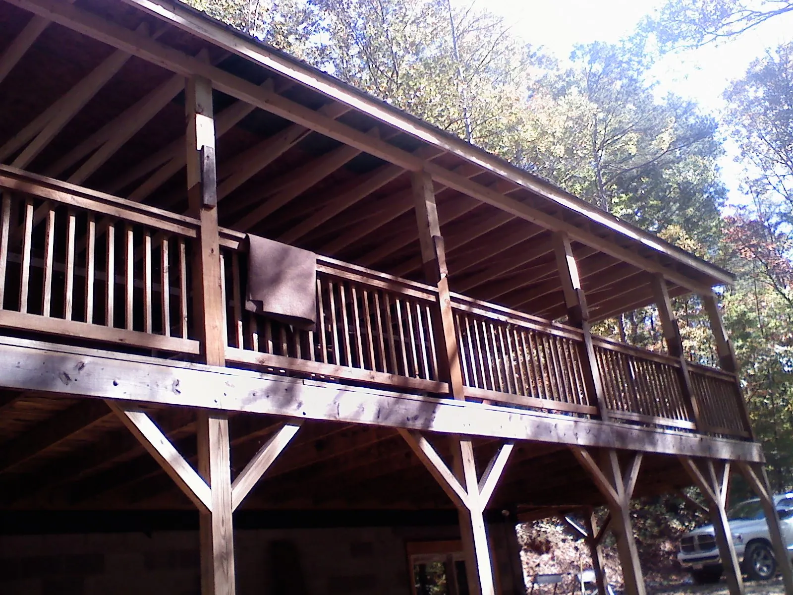 Timber framing under a new elevated porch and deck in Hartsville